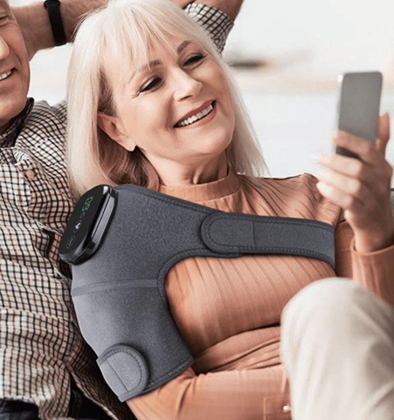 Schouder verwarmers tegen artrose warmte therapie zere schouders infra rood pijnverlichting artrose reuma. roodlicht therapie voor schouders. infrarood schouder brace voor support, warmte en massasge.